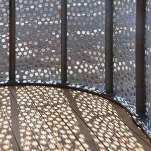 Some perforated aluminum balcony railing designs can generate wind-induced noise