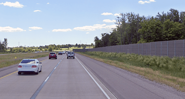 Highway noise control barrier
