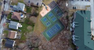 Arial View Of Pickleball and Tennis Courts near residences
